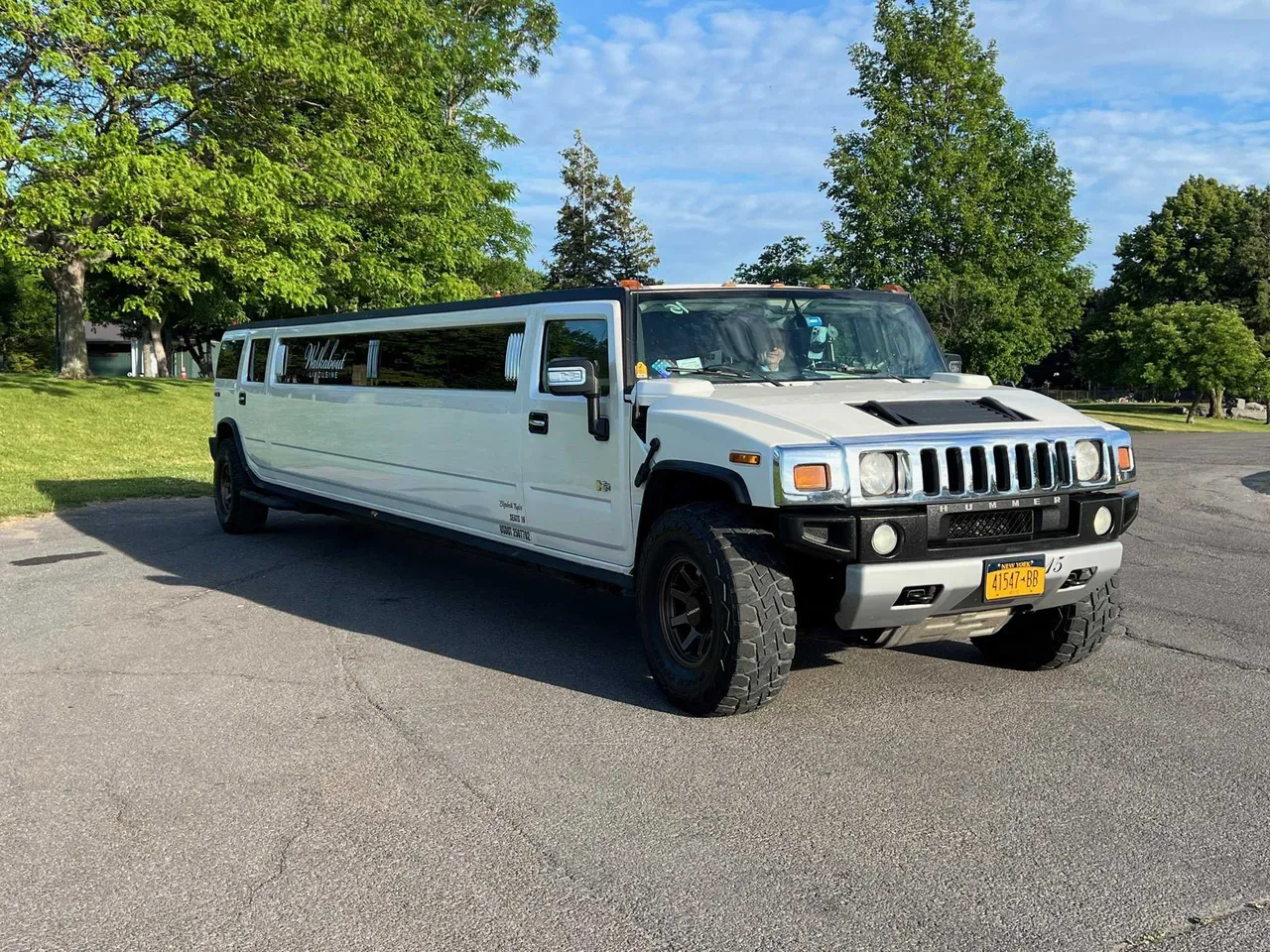 White Hummer H2 Limousine - Elizabeth Taylor for limo rental White Hummer H2 Limousine - Elizabeth Taylor for limo rental